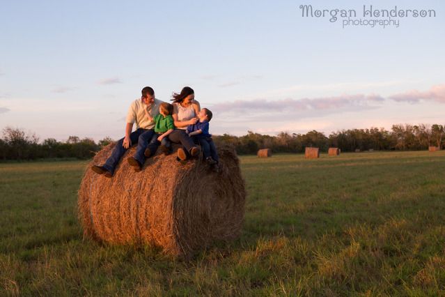 family photography with hay bales