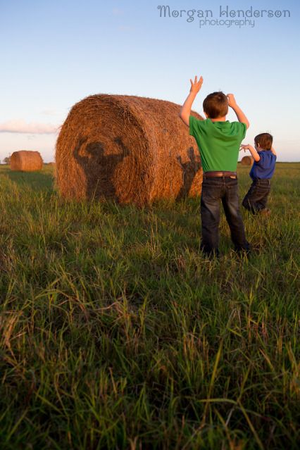 family photography with hay bales