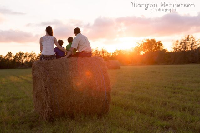family photography with hay bales